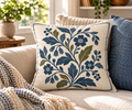 Gathered at Home Botanical 18 by 18 pillow styled on a neutral sofa