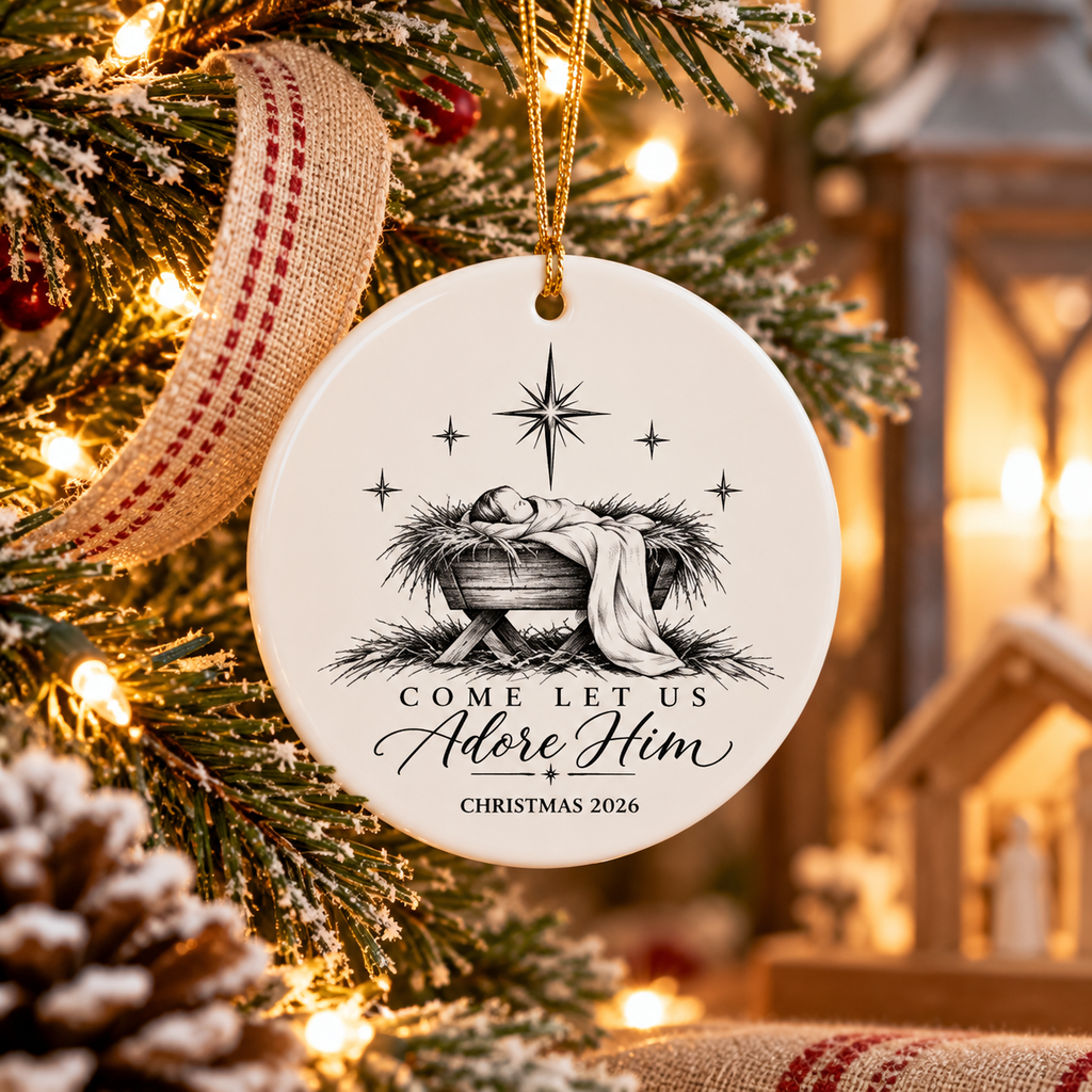 Come Let Us Adore Him personalized manger Christmas ornament in a warm nativity-inspired holiday setting