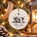 Come Let Us Adore Him personalized manger Christmas ornament in a warm nativity-inspired holiday setting